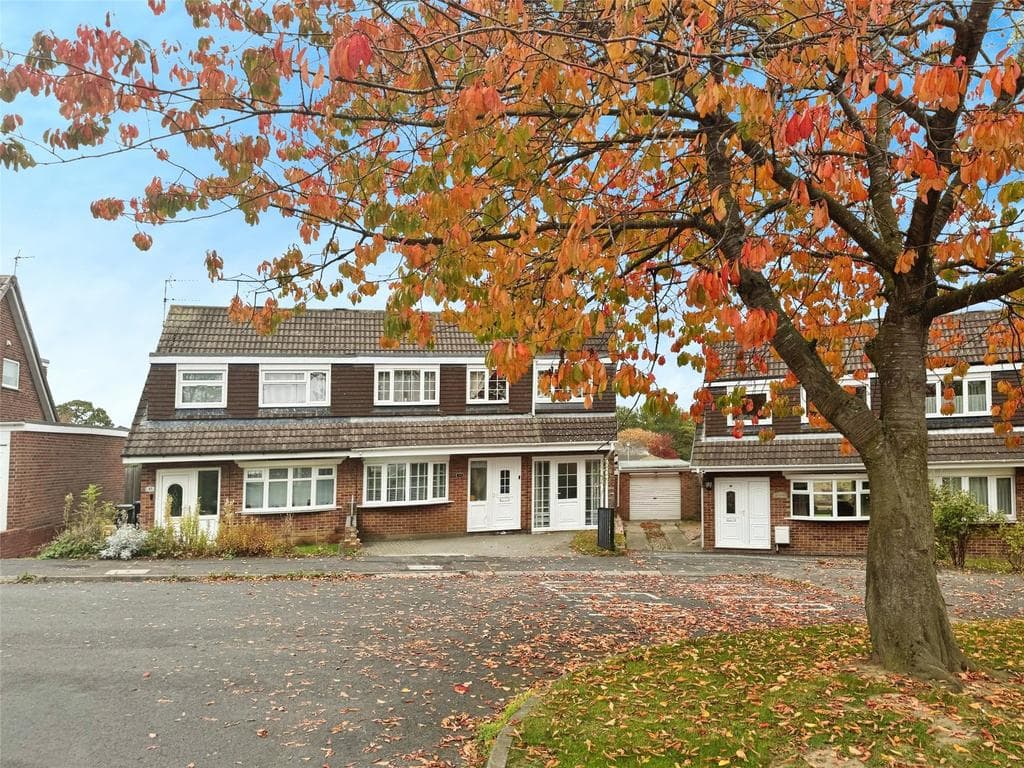 Nordic Spa House on a tree-lined street in Brandon