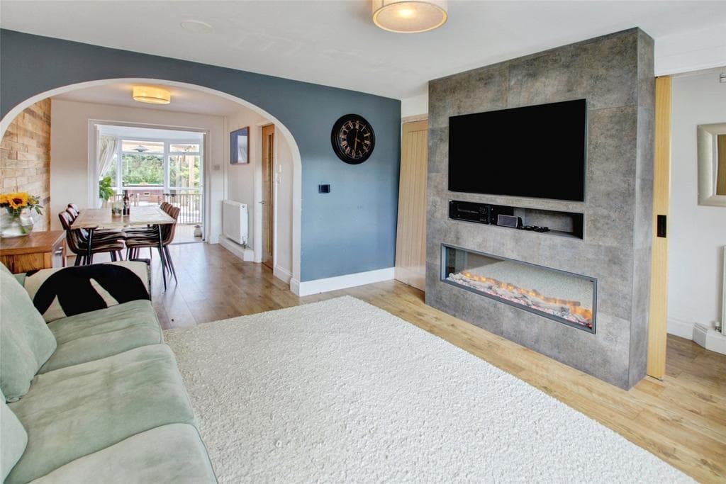 Living room with smart TV and media wall